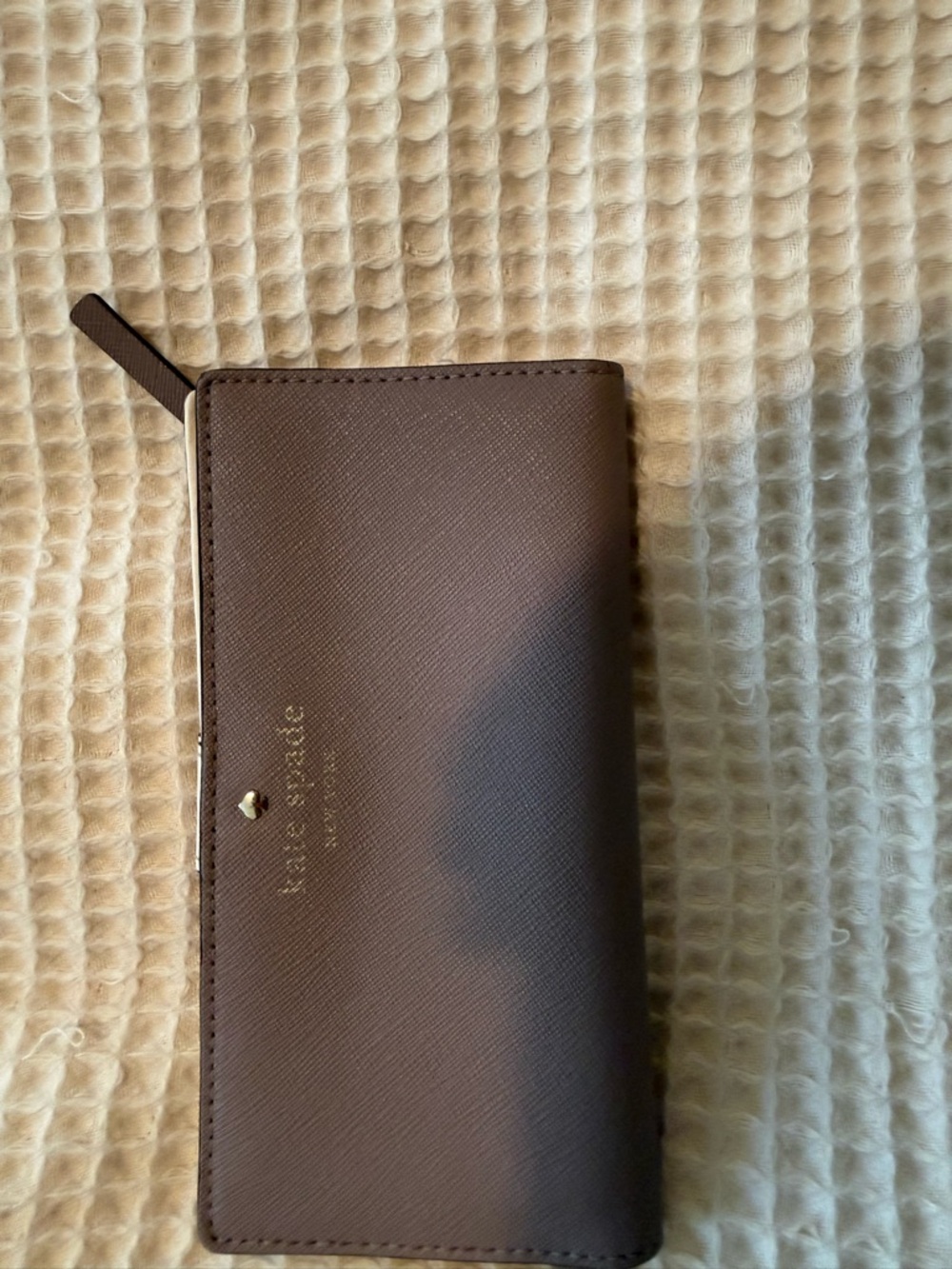 kate spade brown saffiano zip wallet with gold logo
